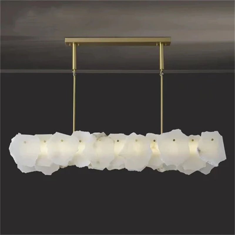 Carlos Alabaster Modern Snowflake Linear Chandelier Over Dining Table - Joyfuzzy