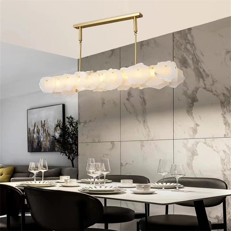 Carlos Alabaster Modern Snowflake Linear Chandelier Over Dining Table - Joyfuzzy