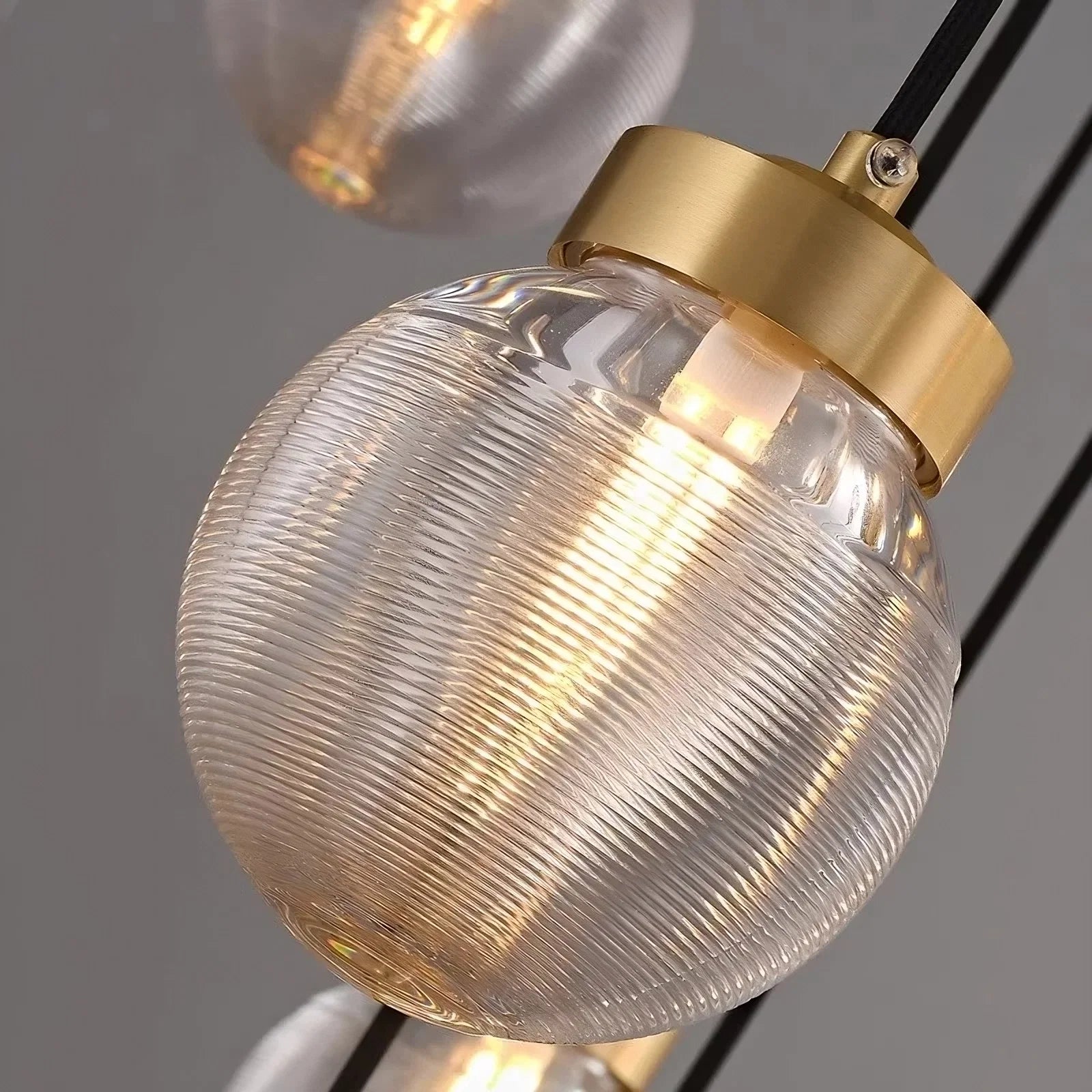 Bossen globe chandelier glass sphere detail