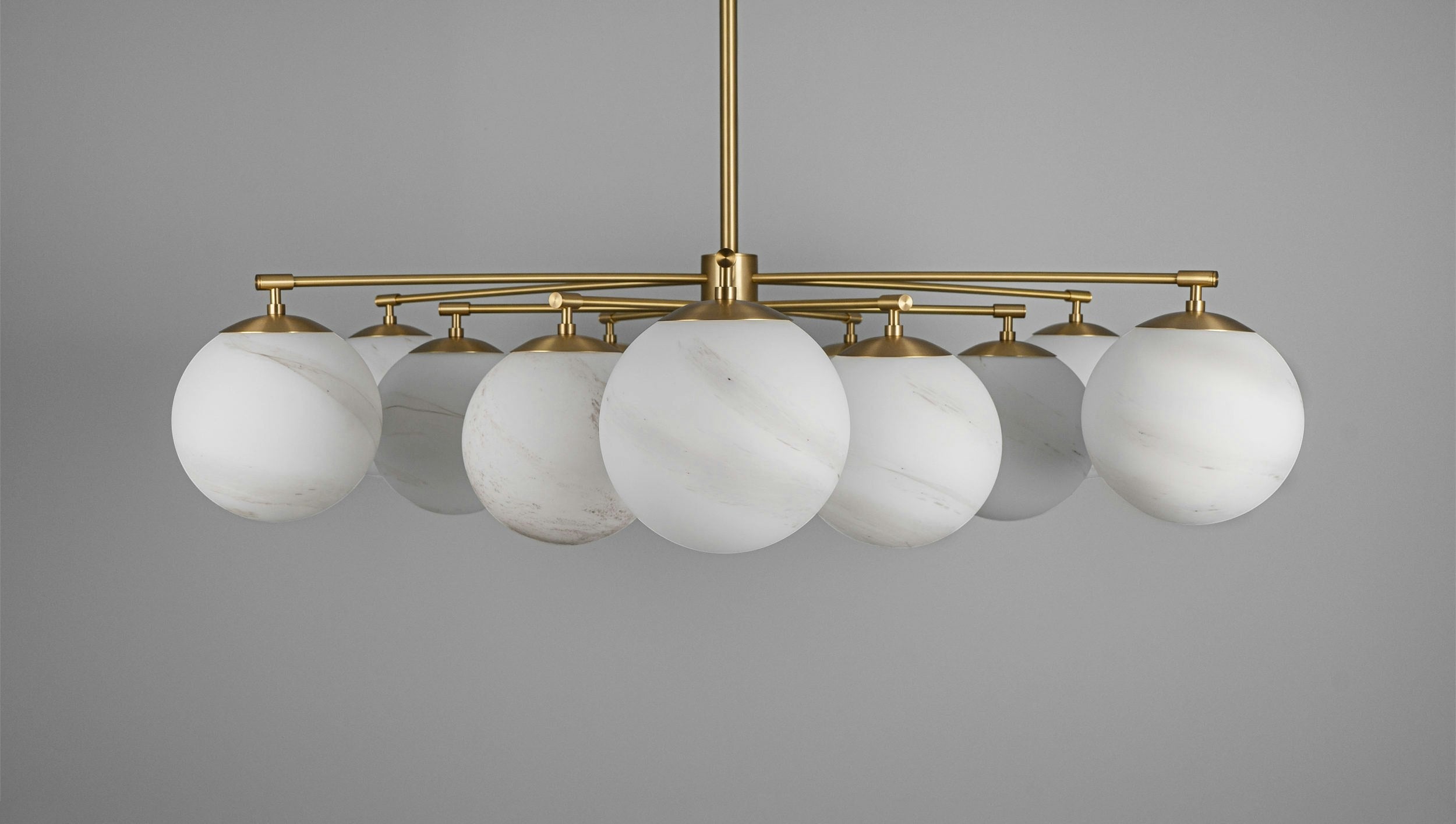 Orion Oval Flush Mount Base Chandelier Ø47.8″ - Lacquered burnished brassSoda Lime Marble Matte GlassJoyfuzzy