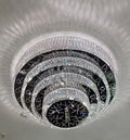 https://cdn.shopify.com/s/files/1/0736/8795/7790/files/oversized-modern-creative-flush-mount-round-multi-layers-crystal-pendant-chandelier-for-livingdining-roomhallway-merlin-lamps-5.webp?v=1765402421