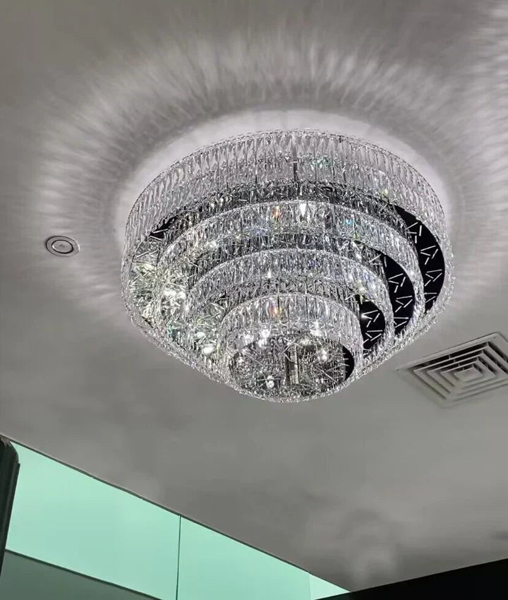 https://cdn.shopify.com/s/files/1/0736/8795/7790/files/oversized-modern-creative-flush-mount-round-multi-layers-crystal-pendant-chandelier-for-livingdining-roomhallway-merlin-lamps-7.webp?v=1765402424