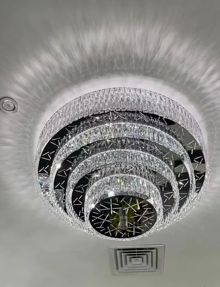 https://cdn.shopify.com/s/files/1/0736/8795/7790/files/oversized-modern-creative-flush-mount-round-multi-layers-crystal-pendant-chandelier-for-livingdining-roomhallway-merlin-lamps-8.webp?v=1765402426